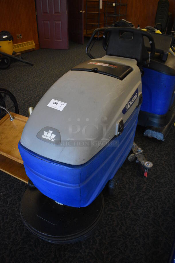 Windsor Saber Tan and Blue Commercial Floor Cleaning Machine. Comes w/ Key! 32x51x44. Unit Was In Working Condition When Restaurant Closed. (ballroom) - Image 2 of 6