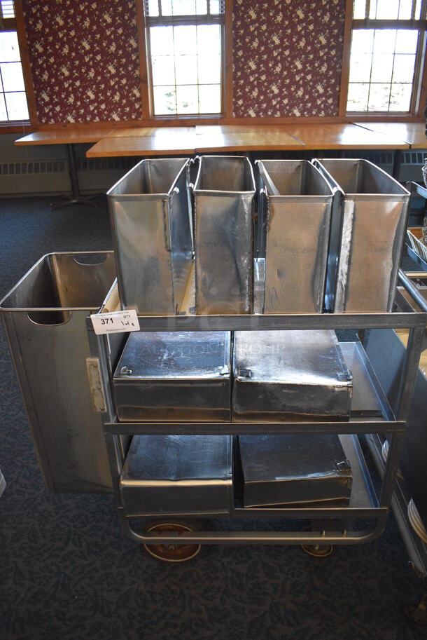 Stainless Steel Commercial 3 Tier Cart w/ Push Handle and 9 Trash Bin Attachments on Commercial Casters. 41x19.5x34. Includes 17x5.5x11.5. (back dining room)