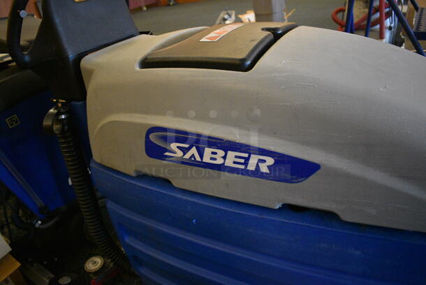 Windsor Saber Tan and Blue Commercial Floor Cleaning Machine. Comes w/ Key! 32x51x44. Unit Was In Working Condition When Restaurant Closed. (ballroom) - Image 4 of 6