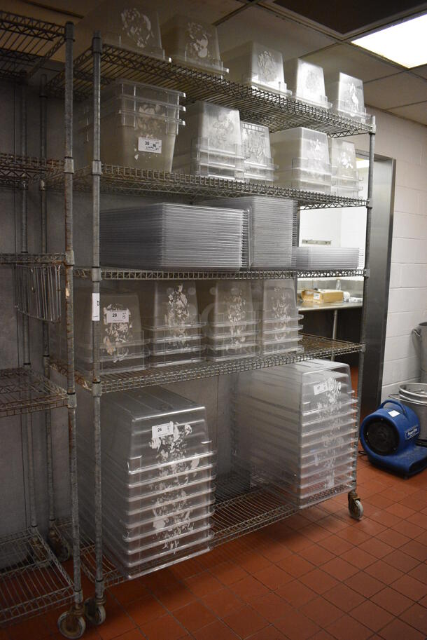 Metro Style Chrome Finish 5 Tier Shelving Unit on Commercial Casters. Does Not Include Contents. BUYER MUST DISMANTLE. PCI CANNOT DISMANTLE FOR SHIPPING. PLEASE CONSIDER FREIGHT CHARGES. 65x24x92. (kitchen) - Image 1 of 5