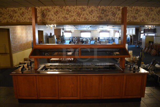 Portable Buffet Station w/ 4 Plate Return Chutes, Sneeze Guard and Wooden Exterior on Commercial Casters. 135x42x98. Unit Was In Working Condition When Restaurant Closed. BUYER MUST REMOVE. (buffet) - Image 2 of 8