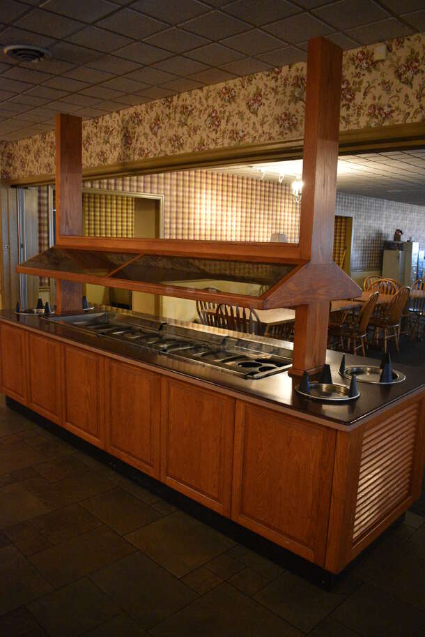 Portable Buffet Station w/ 4 Plate Return Chutes, Sneeze Guard and Wooden Exterior on Commercial Casters. 135x42x98. Unit Was In Working Condition When Restaurant Closed. BUYER MUST REMOVE. (buffet) - Image 3 of 8