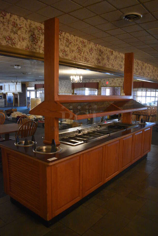 Portable Buffet Station w/ 4 Plate Return Chutes, Sneeze Guard and Wooden Exterior on Commercial Casters. 135x42x98. Unit Was In Working Condition When Restaurant Closed. BUYER MUST REMOVE. (buffet) - Image 8 of 8