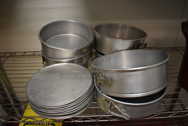 6 Metal Springform Pans w/ 18 Extra Bottom Pieces. 9.5x9.5x3. 6 Times Your Bid! (icing kitchen)