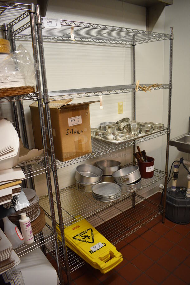 Chrome Finish 5 Tier Shelving Unit. Does Not Include Contents. BUYER MUST DISMANTLE. PCI CANNOT DISMANTLE FOR SHIPPING. PLEASE CONSIDER FREIGHT CHARGES. 48x18x74.5. (icing kitchen) - Image 1 of 3