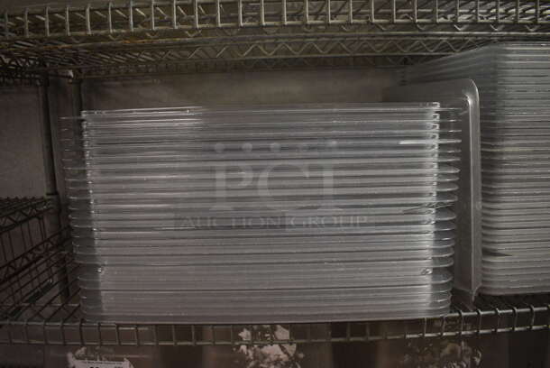 ALL ONE MONEY! Lot of 69 Clear Poly Lids! 18x26x1, 12x18x1. (kitchen) - Image 2 of 6