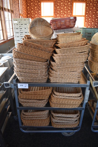 Stainless Steel Commercial 3 Tier Cart w/ Push Handle and Various Baskets on Commercial Casters. 33x19.5x34. Includes 19x14x2.5. (back dining room)