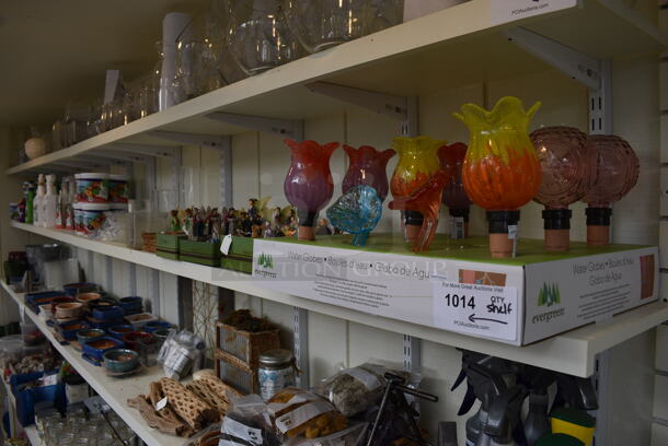 ALL ONE MONEY! Shelf Lot of Various Items Including Water Globes, Fertilizer and Skipping Fairies! BUYER MUST REMOVE. Shelf: 167x12. (greenhouse) - Image 1 of 10