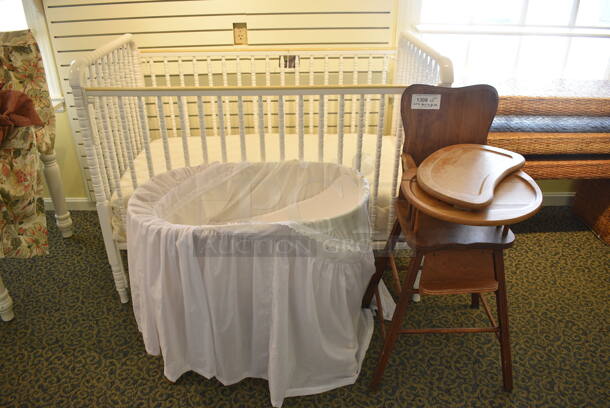 ALL ONE MONEY! Lot of White Crib, Bassinet and Wooden High Chair. Includes 32x19x27. (yellow clothing store) - Image 2 of 5