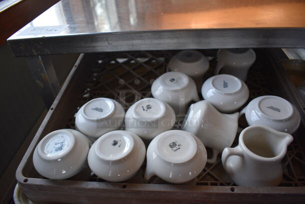 Stainless Steel Commercial Pan Rack w/ 5 Dish Caddies and Approximately 60 White Ceramic Pitchers on Commercial Casters. 30.5x22x34. Includes 4x3.5x3.5. (back dining room) - Image 6 of 9