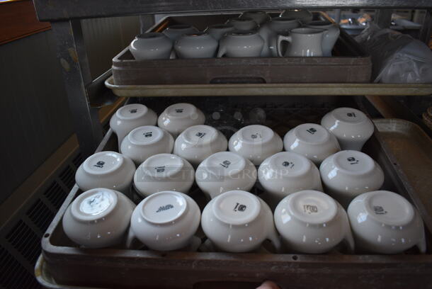 Stainless Steel Commercial Pan Rack w/ 5 Dish Caddies and Approximately 60 White Ceramic Pitchers on Commercial Casters. 30.5x22x34. Includes 4x3.5x3.5. (back dining room) - Image 7 of 9