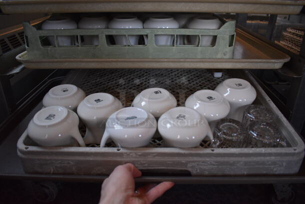 Stainless Steel Commercial Pan Rack w/ 5 Dish Caddies and Approximately 60 White Ceramic Pitchers on Commercial Casters. 30.5x22x34. Includes 4x3.5x3.5. (back dining room) - Image 8 of 9