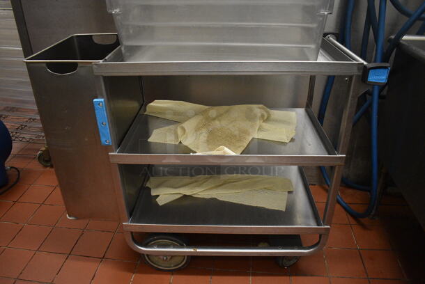 Stainless Steel Commercial 3 Tier Cart w/ Attached Trash Can and Push Handle on Commercial Casters. Does Not Include Contents. 41x20x34.5. (kitchen) - Image 1 of 5