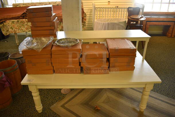 White Wooden Table w/ 30 NEW Metal Basket Style Trays. 60x36x34. (yellow clothing store)