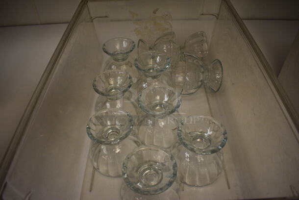 10 Footed Bowls in Clear Bin. 5x5x4.5. 10 Times Your Bid! (icing kitchen)
