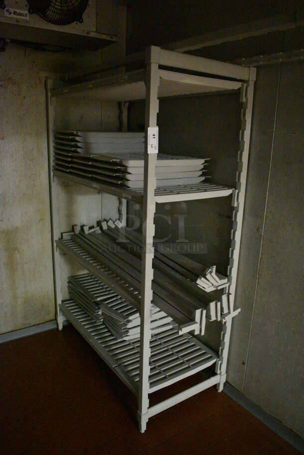 Poly Gray 4 Tier Shelving Unit w/ Extra Pieces. BUYER MUST DISMANTLE. PCI CANNOT DISMANTLE FOR SHIPPING. PLEASE CONSIDER FREIGHT CHARGES. 48x24x72. (kitchen) - Image 1 of 3
