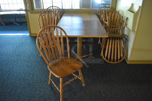 2 Wooden Tables w/ 8 Wooden Dining Chairs. 36x36x30. 18x17.5x37.5. 2 Times Your Bid! (main dining room)