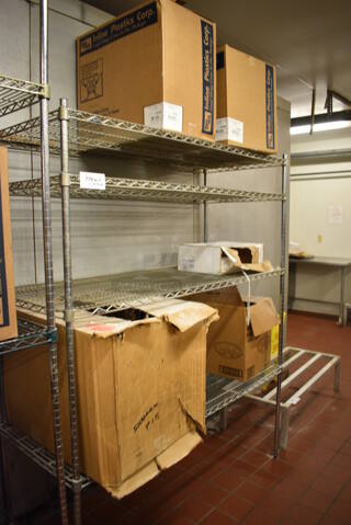 Chrome Finish 4 Tier Shelving Unit w/ Contents! BUYER MUST DISMANTLE. PCI CANNOT DISMANTLE FOR SHIPPING. PLEASE CONSIDER FREIGHT CHARGES. 60x24x74. (bakery kitchen)