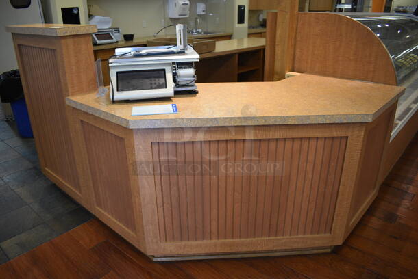 Wood Pattern Counter w/ Stone Pattern Countertop. Does Not Include Contents. BUYER MUST REMOVE. 85x57x48. (gift shop)