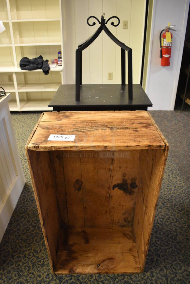 2 Various Items; Black Rack and Wooden Crate. Includes 21x13.5x34.5. 2 Times Your Bid! (yellow clothing store)