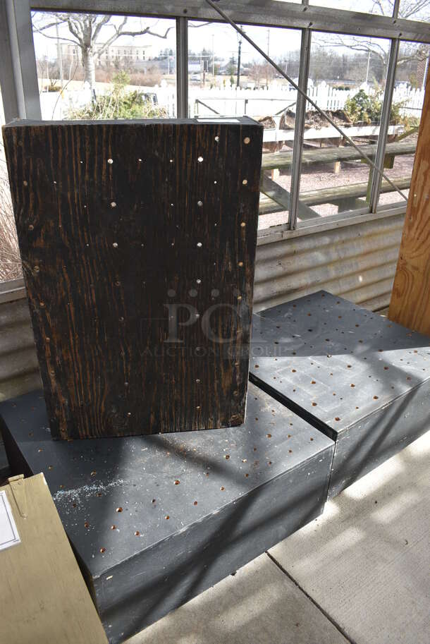 3 Black Wooden Stands. BUYER MUST REMOVE. 24x36x9, 32x32x13. 3 Times Your Bid! (greenhouse)