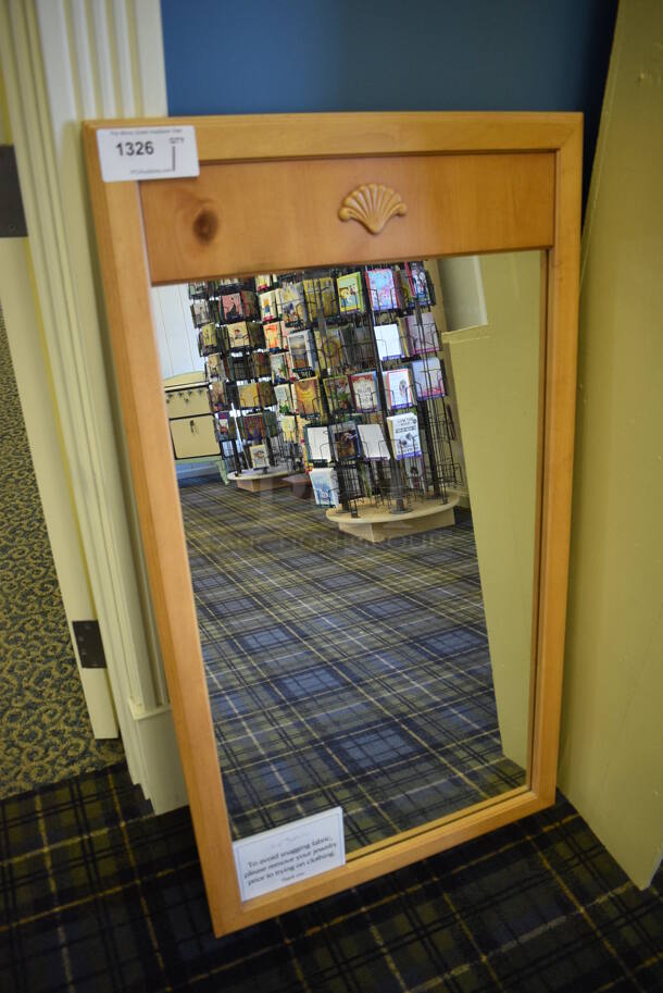 Mirror w/ Wooden Frame. 25x1x45.5. (blue retail store)