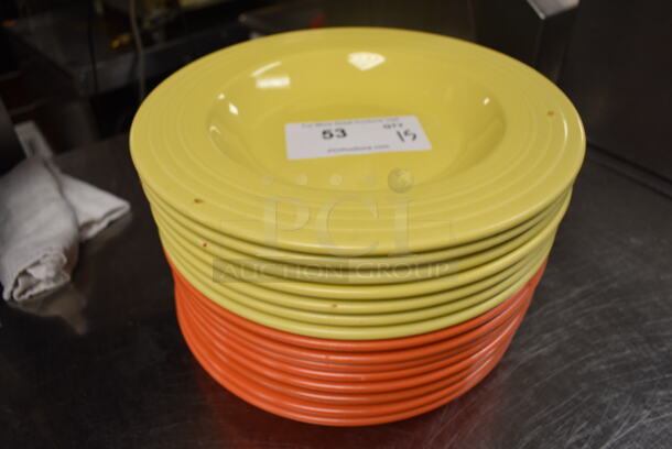15 Fiestaware Ceramic Plates; 7 Yellow and 8 Orange. 12x12x1.5. 15 Times Your Bid! (kitchen) - Image 1 of 4