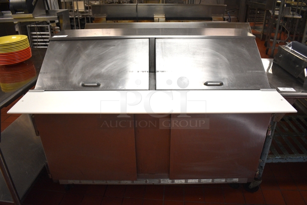Beverage Air Model SP60-24M Stainless Steel Commercial Sandwich Salad Prep Table Bain Marie Mega Top w/ Cutting Board on Commercial Casters. 115 Volts, 1 Phase. 60x36.5x46. Unit Was In Working Condition When Restaurant Closed. (kitchen)