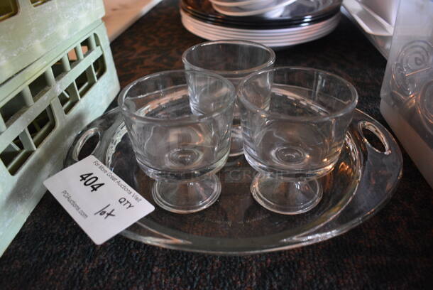 ALL ONE MONEY! Lot of 4 Glass Items; 3 Footed Bowls and Tray. 13x10x2. 3.5x3.5x4. (main dining room)