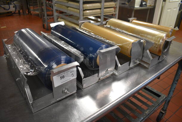 4 Various Rolls of Plastic Wrap in Stainless Steel Holders. Includes 22x9x8. 4 Times Your Bid! (kitchen)