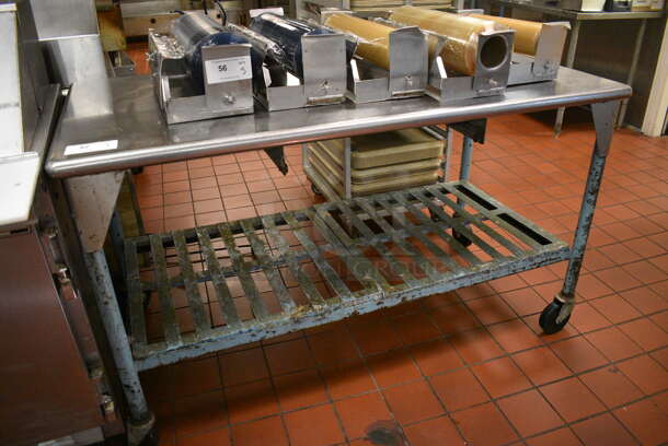 Stainless Steel Commercial Table w/ Metal Dunnage Rack Style Under Shelf on Commercial Casters. Does Not Include Contents. 60x30x35. (kitchen)