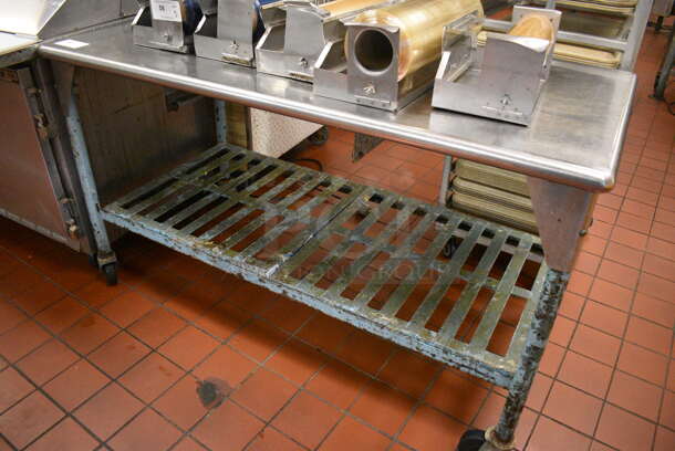 Stainless Steel Commercial Table w/ Metal Dunnage Rack Style Under Shelf on Commercial Casters. Does Not Include Contents. 60x30x35. (kitchen) - Image 2 of 3