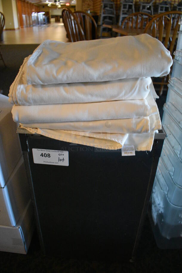 ALL ONE MONEY! Lot of Tablecloths in Bin! 15x10x24. Includes 54x120. (main dining room)