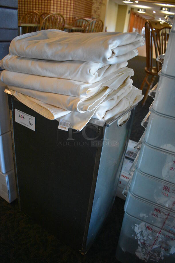 ALL ONE MONEY! Lot of Tablecloths in Bin! 15x10x24. Includes 54x120. (main dining room) - Image 2 of 4