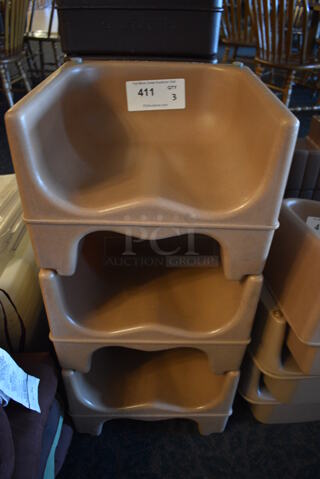 3 Brown / Tan Poly Booster Seats. 12.5x12x9. 3 Times Your Bid! (main dining room)