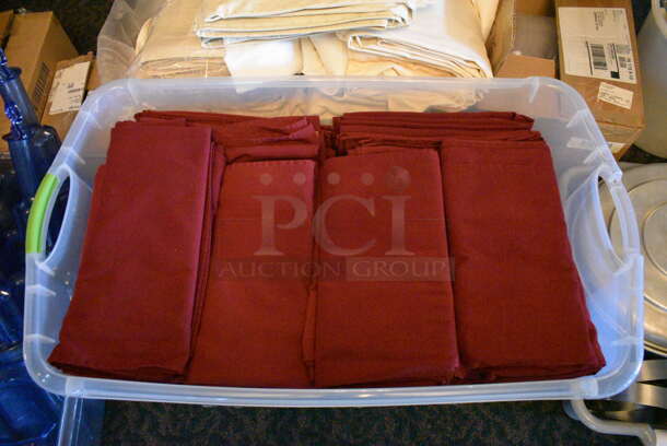 ALL ONE MONEY! Lot of Red Tablecloths in Clear Bin! 34x20x15. 54x54. (main dining room)