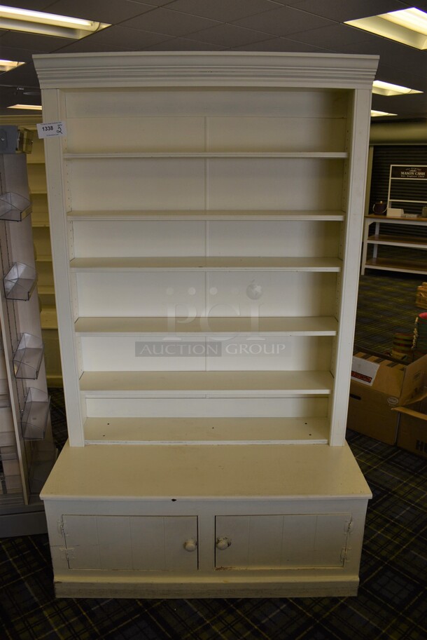 2 White Wooden Shelving Unit w/ 2 Doors. 47x23x78. 2 Times Your Bid! (blue retail store)