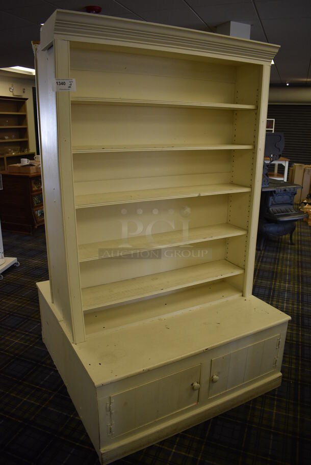 2 White Wooden Shelving Unit w/ 2 Doors. 47x23x78. 2 Times Your Bid! (blue retail store)