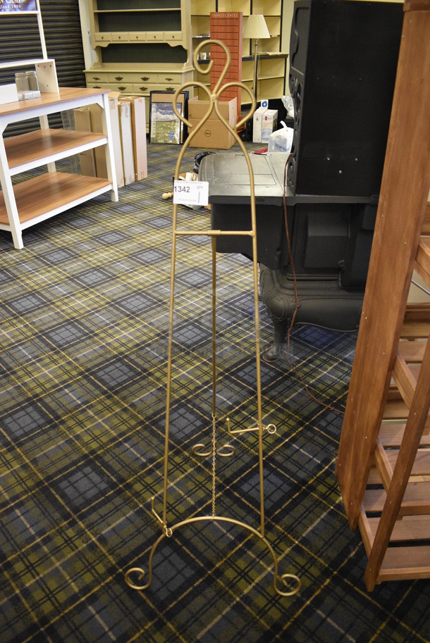 Gold Finish Metal Easel. 20x22x55. (blue retail store)