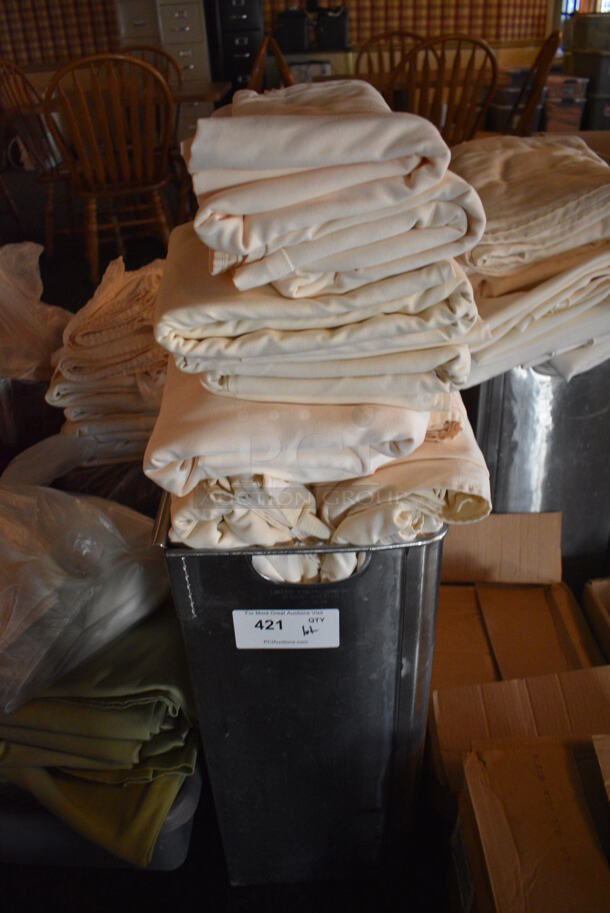 ALL ONE MONEY! Lot of White Tablecloths in Metal Bin! 15x10x24. 54x120. (main dining room)
