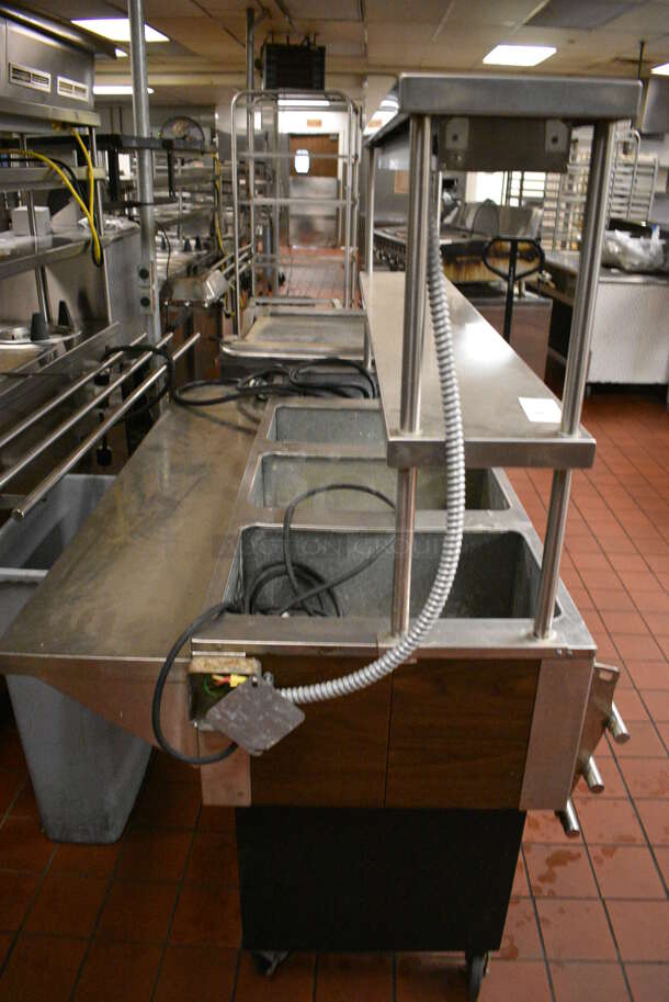 Eagle Stainless Steel Commercial Electric Powered 4 Bay Steam Table w/ Double Tier Over Shelf, Warming Strip and Tray Slide on Commercial Casters. 64x37x62. Unit Was In Working Condition When Restaurant Closed. (kitchen) - Image 6 of 9
