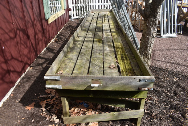 Wooden Stand. BUYER MUST REMOVE. 216x36x27. (greenhouse patio)