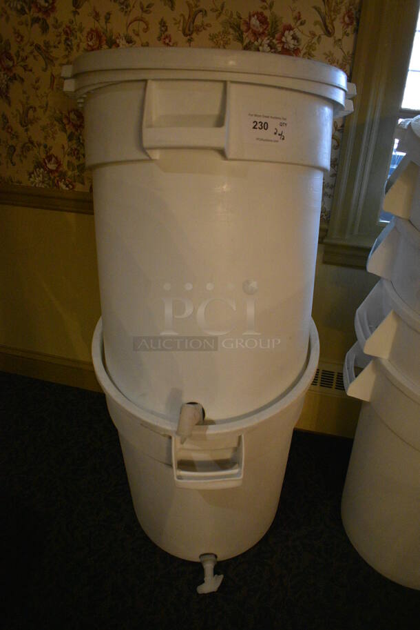 2 White Poly Trash Cans w/ Dispensers and Lids. 24x25x28. 2 Times Your Bid! (buffet)