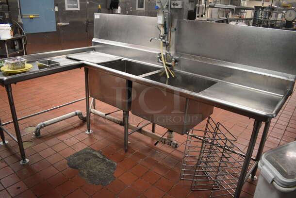 Stainless Steel Commercial 2 Bay Sink w/ Dual Drainboards, Faucets, Handles and Back Splash. Does Not Include Contents. BUYER MUST REMOVE. 105x64x56. Bays 24x24x14. Drainboards 62x30x38, 24x26x2. (kitchen) - Image 5 of 6