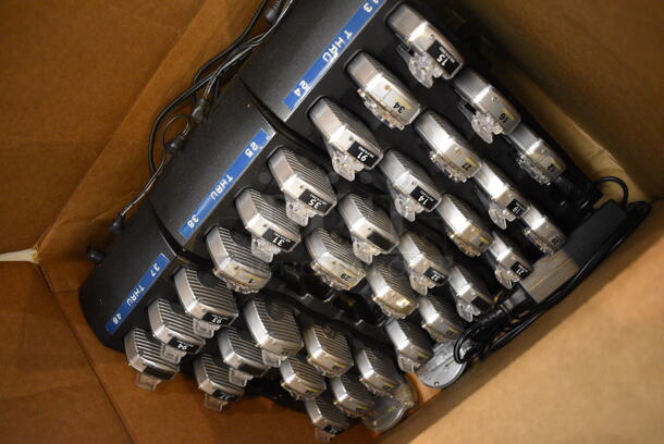 ALL ONE MONEY! Lot of 3 Charging Bases and 31 Beepers. 5x13x3. (gift shop) - Image 2 of 4