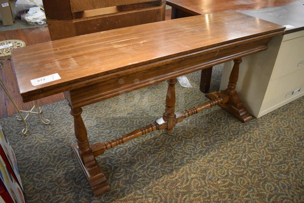 Wooden Table. 60x18x30. (gift shop)