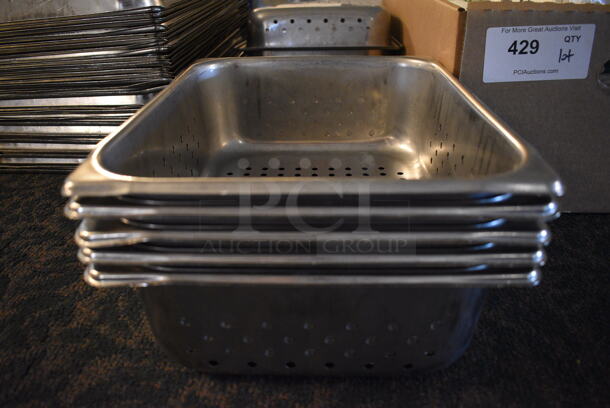 5 Stainless Steel 1/2 Size Perforated Drop In Bins. 1/2x4. 5 Times Your Bid! (main dining room)