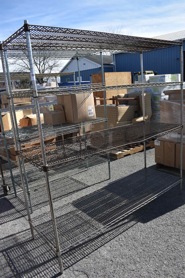 Chrome Finish 4 Tier Shelving Unit. BUYER MUST DISMANTLE. PCI CANNOT DISMANTLE FOR SHIPPING. PLEASE CONSIDER FREIGHT CHARGES. 72x24x74. (warehouse) - Image 1 of 4