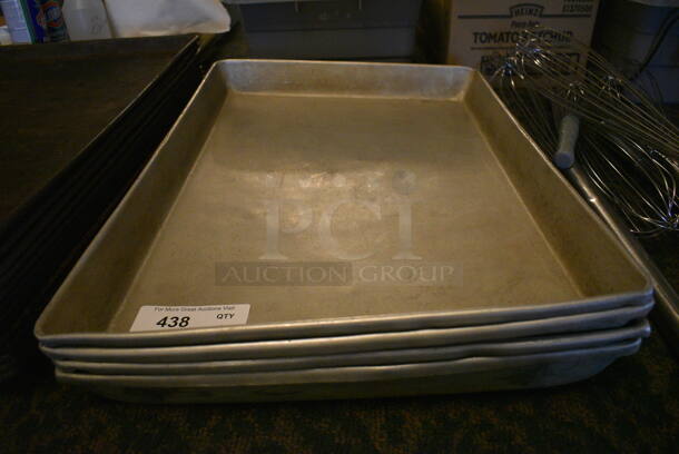 4 Metal Baking Pans. 25.5x17.5x2. 4 Times Your Bid! (main dining room)