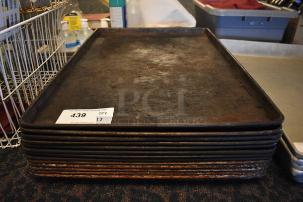 13 Metal Full Size Baking Pans. 18x26x1. 13 Times Your Bid! (main dining room)